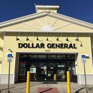 DAYTONA BEACH, FL-MARCH 19, 2016: New Dollar General store in this Florida beach town. Dollar General is a small box retailer with thousands of stores throughout the United States.; Shutterstock ID 394598608