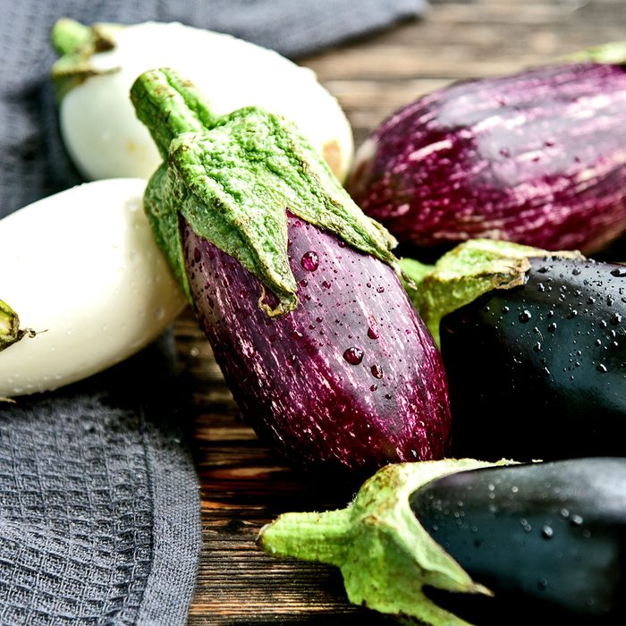 3 colorful mixed of Eggplant (Solanum melongena) or aubergine with water drop.