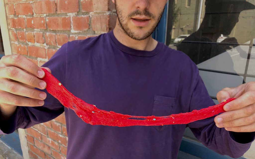 Man holding Kool-aid slime