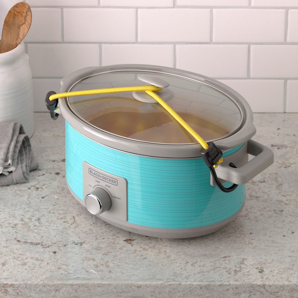 Easy Tip for Transporting Food in a Slow Cooker Without a Locking Lid