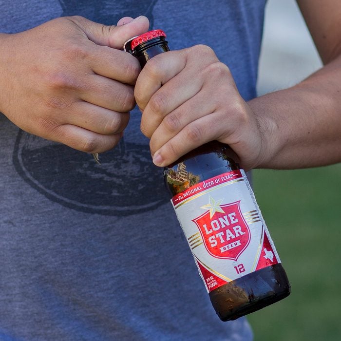 opening Can of Lone Star beer