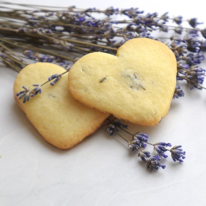 Fresh homemade lavender cookies on light background