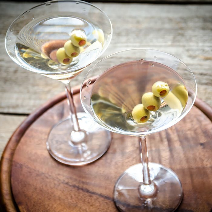 Two olive martini cocktails