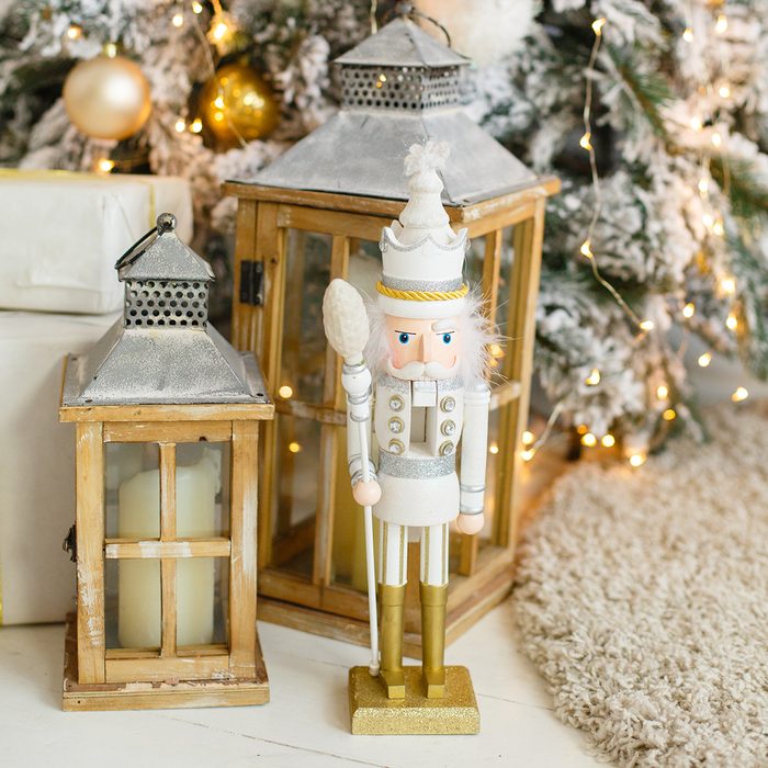 Classic vintage nutcracker on New Year background