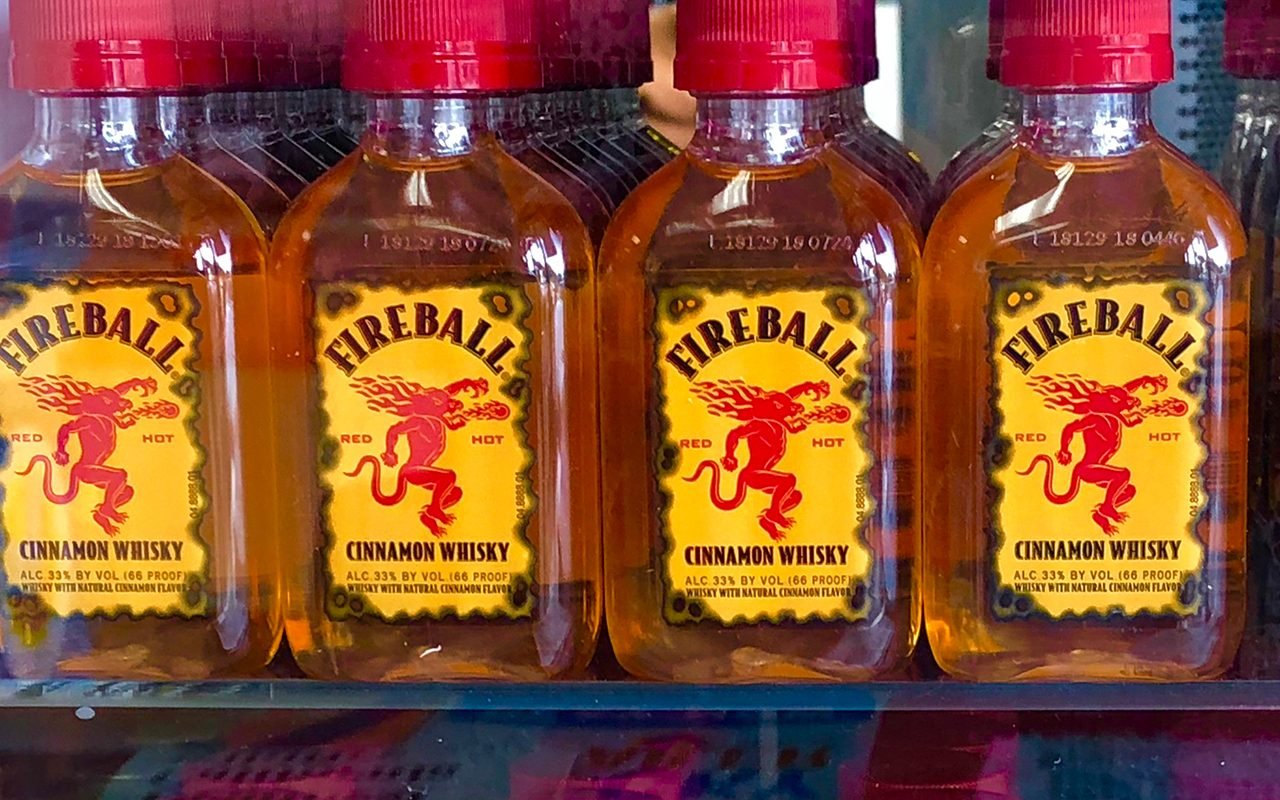Fireball Cinnamon Whisky is a mixture of whisky, cinnamon flavoring and sweeteners that is produced by the Sazerac Company.