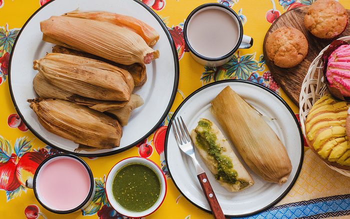 mexican tamales of corn leaves with green sauce and atole, Tamales Breakfast in Mexico
