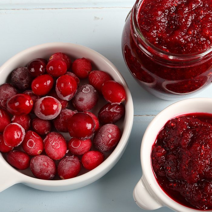 Cranberries in a bowl and cranberry jam in a jar.; Shutterstock ID 623001326; Job (TFH, TOH, RD, BNB, CWM, CM): TOH