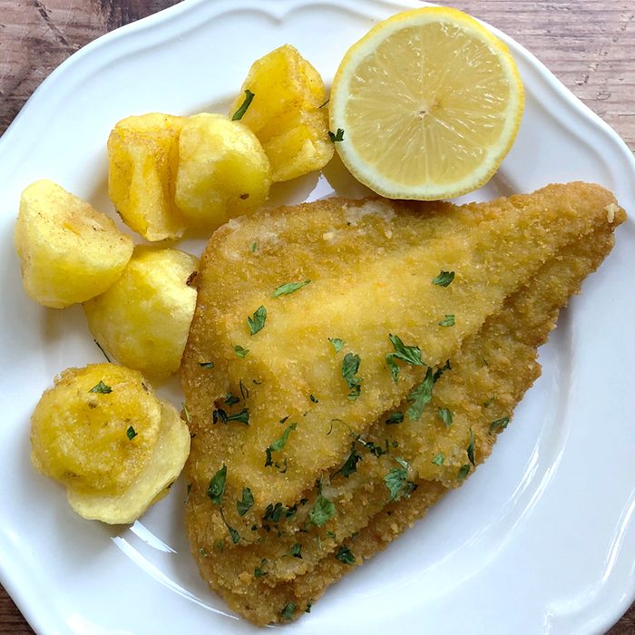 Fried fish with fried potatoes and sauce tartare.; Shutterstock ID 1489907675; Job (TFH, TOH, RD, BNB, CWM, CM): TOH