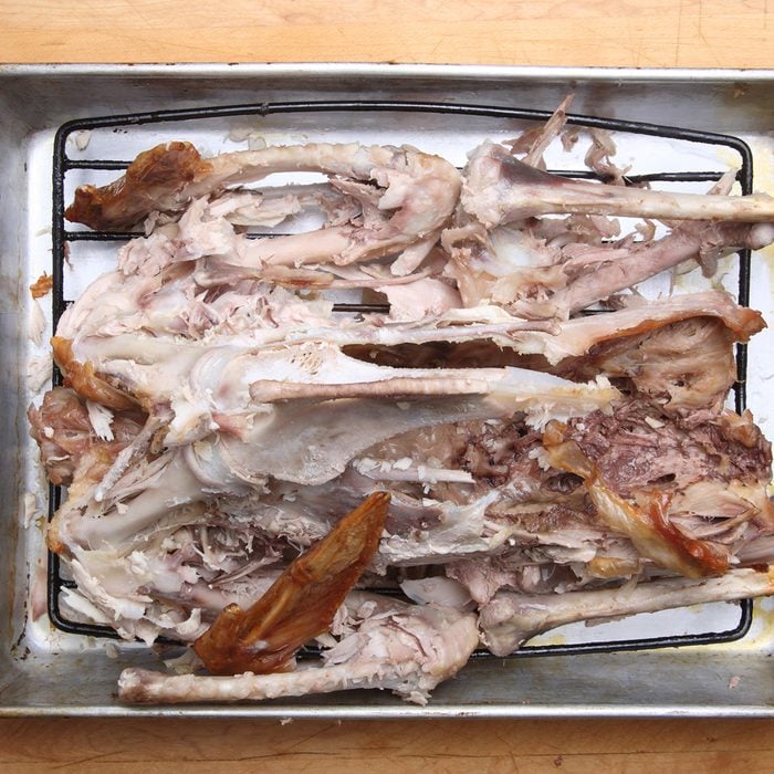 Turkey carcass in roasting pan