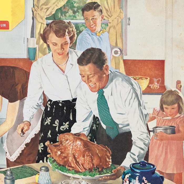 vintage ad of family helping mom et the table for thanksgiving