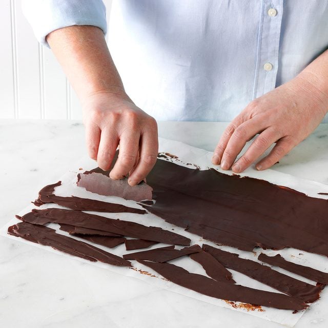 Making the Chocolate Shards with the hardened melted chocolate