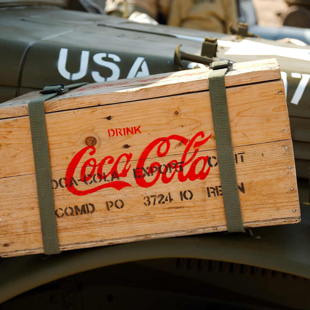 Saunton, Devon, UK - 15th June 2019: World War 2 reenactment (D-day) weekend. A period WW2 wooden crate depicting Coca Cola attached to the side of a period WW2 vehicle