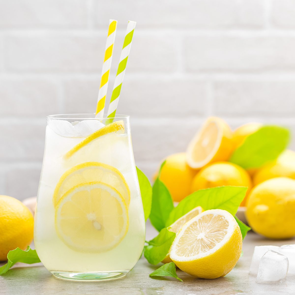 Lemonade. Drink with fresh lemons. Lemon cocktail with juice and ice.