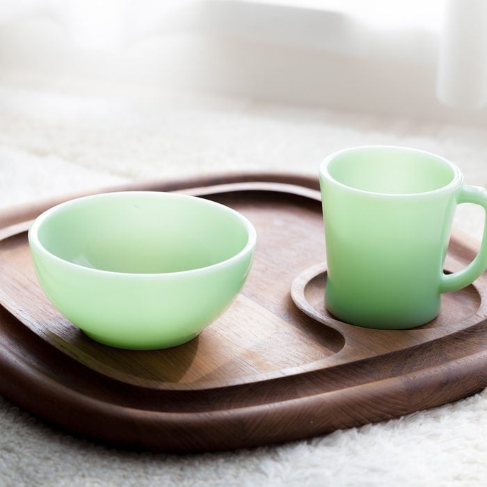 Vintage mug and bowl on wooden tray