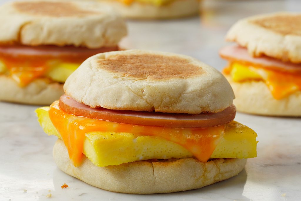 Freezer Breakfast Sandwiches; multiple sandwiches all assembled and beautiful; Cheese Melt