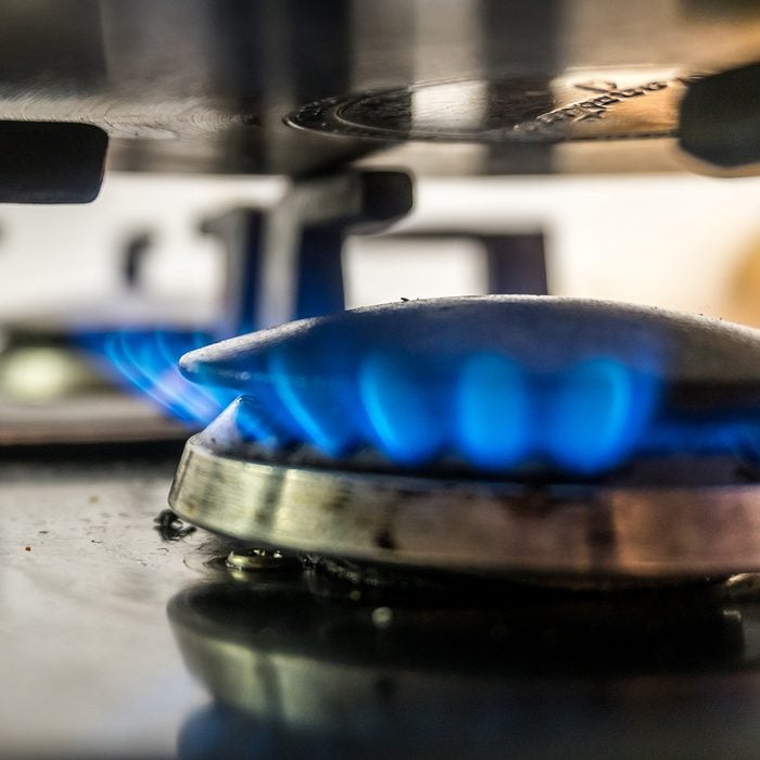 Close-Up of Gas Stove Burner and pot, Brussels, Belgium