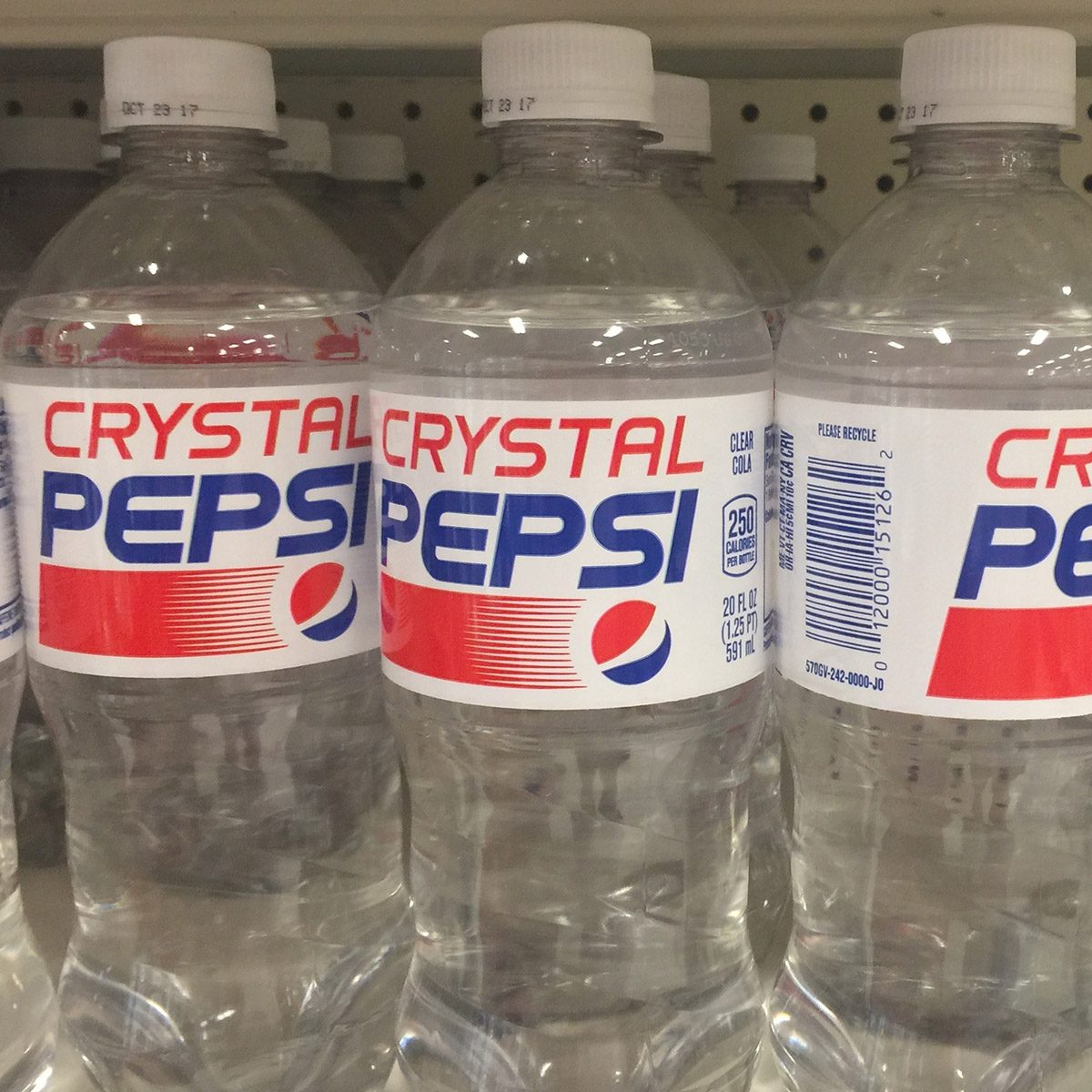 SEPTEMBER 25 2017 - MINNEAPOLIS, MN: Crystal Pepsi plastic soda bottles on the store shelves for sale. This soda flavor was originally sold in the early 1990s, and brought back for nostalgia ; Shutterstock ID 721834738