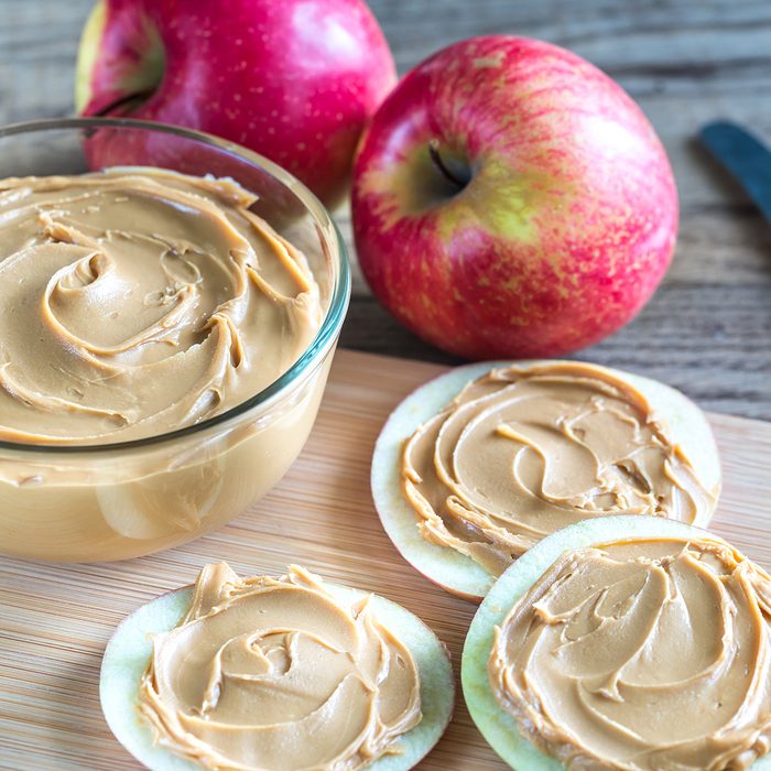 Slices of apples with peanut butter