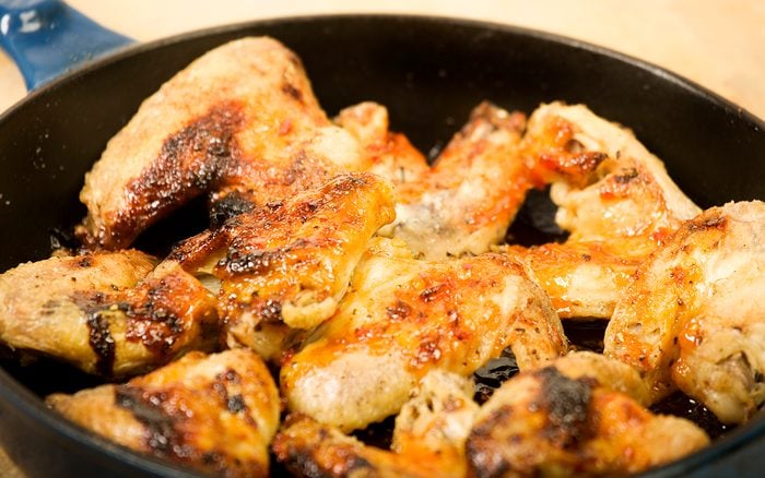 tasty roast chicken wings with spicy sauce