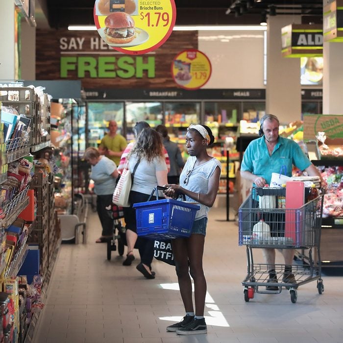 CHICAGO, IL - JUNE 12: Customers shop at an Aldi grocery store on June 12, 2017 in Chicago, Illinois. Aldi has announced plans to open 900 new stores in the United States in the next five years. The $3.4 billion capital investment would create 25,000 jobs and make the grocery chain the third largest in the nation behind Wal-Mart and Kroger. (Photo by Scott Olson/Getty Images)