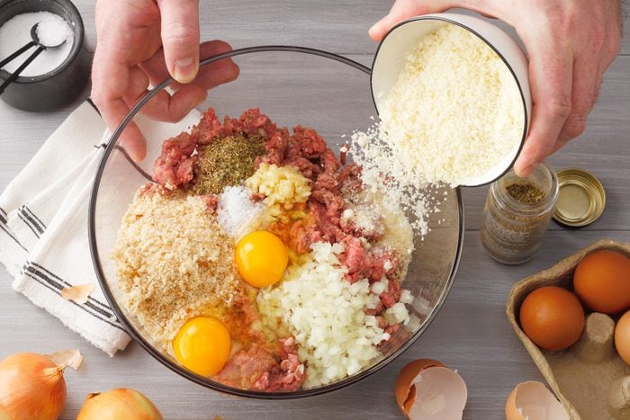 Ingredients mixed in a large bowl to make Meatballs 