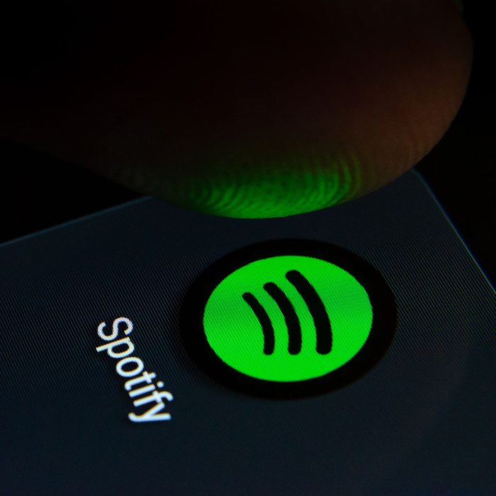 Stone, Staffordshire / United Kingdom - July 28 2019: Spotify app icon on the smartphone screen with visible pixels and the finger about to launch it. Extreme close up photo.; Shutterstock ID 1463748425; Job (TFH, TOH, RD, BNB, CWM, CM): tfh