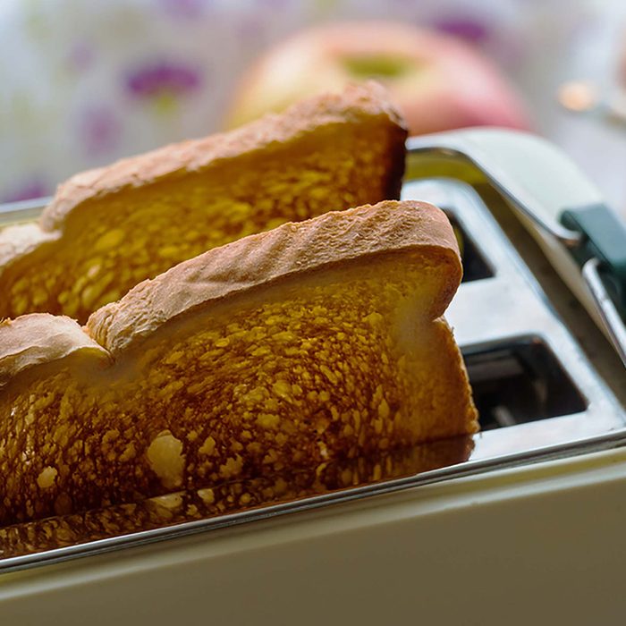 Toast popping out of toaster