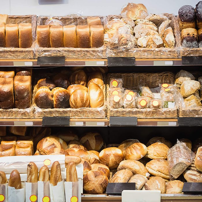 Focus on shelves with bread in a supermarket; Shutterstock ID 547958857