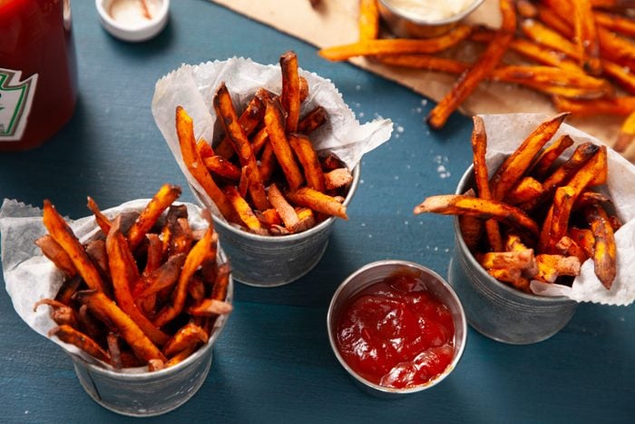 Air Fryer Sweet Potato Fries served in container with tomato ketchup