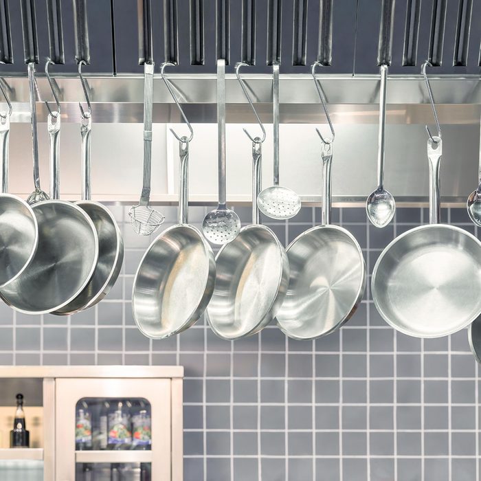 Row of hanging pots and pans