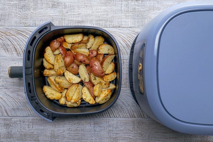 Potatoes in Air Fryer Container