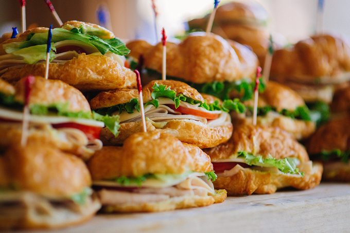 Stack of croissant sandwich at wedding reception party