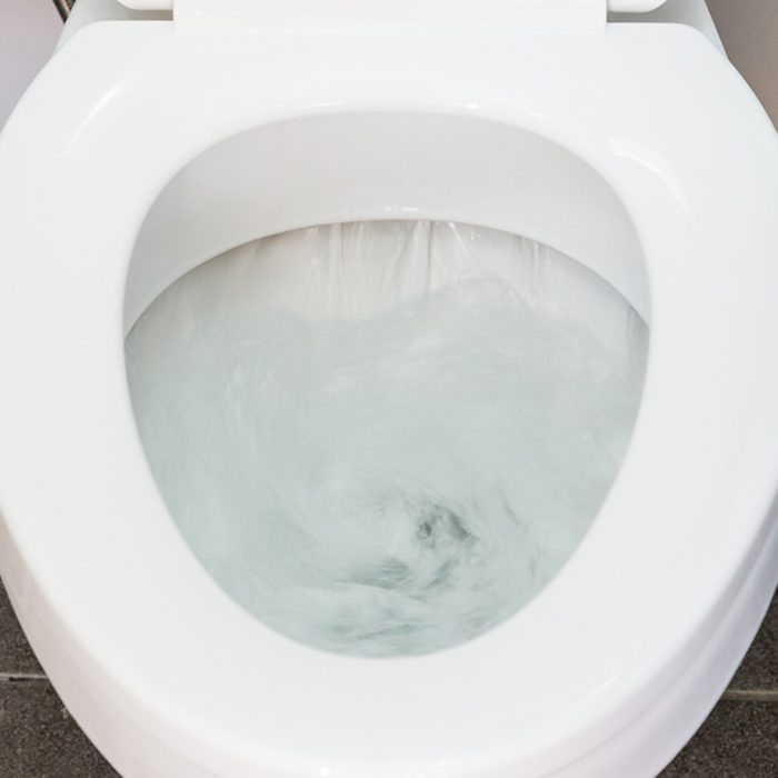 Toilet Flushing Water close up; Shutterstock ID 276637328
