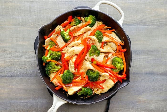 Stir-frying vegetables and Chicken