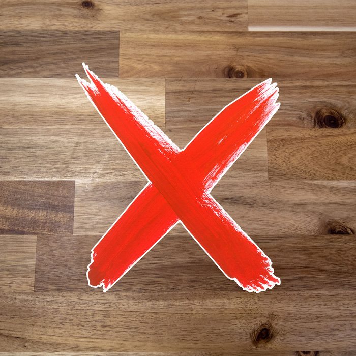 Hardwood floors with red "x"