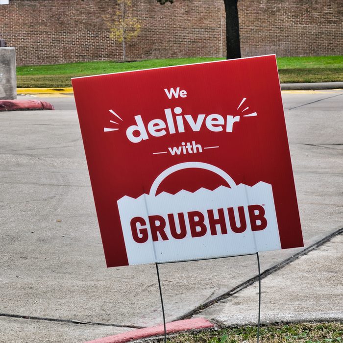 Humble, Texas/USA 01/01/2020: Grubhub sign posted in the ground near some local businesses in Humble, TX. Grubhub is an online fast food delivery service that is becoming increasingly popular in the US.
