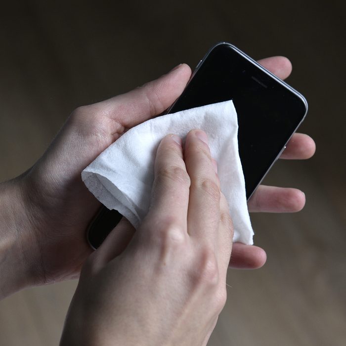To avoid microbial contamination: clean your phone. (Photo by: TIROT/BSIP/Universal Images Group via Getty Images)