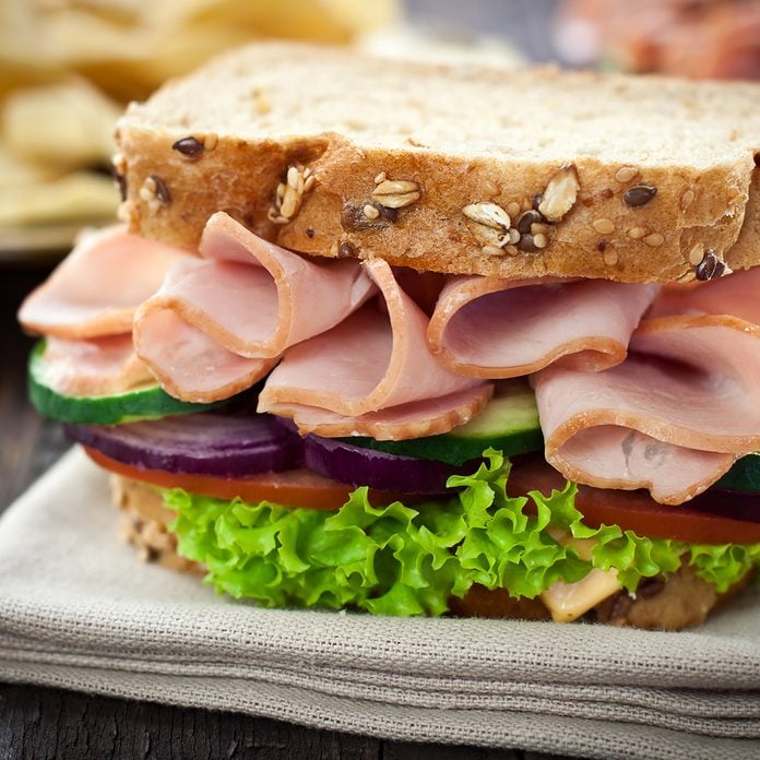 Ham and Cheese Sandwich with Lettuce,Cucumber and red onion