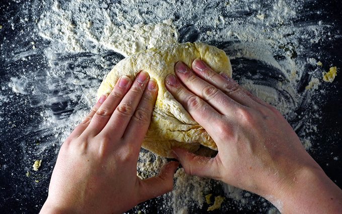 knead the egg noodle dough with your hands until a smooth
