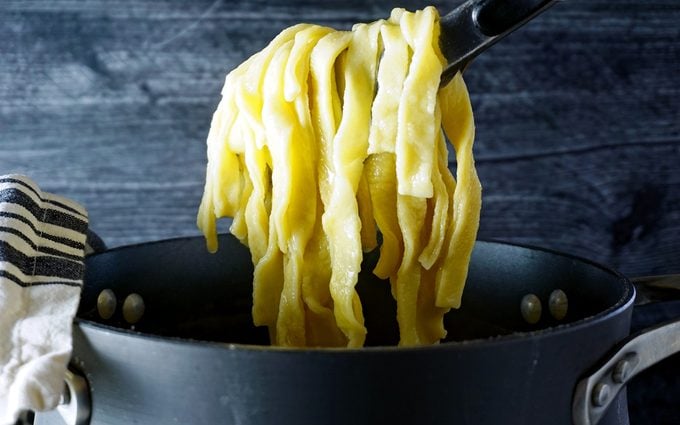 fresh, homemade egg noodles cooked in boiling water