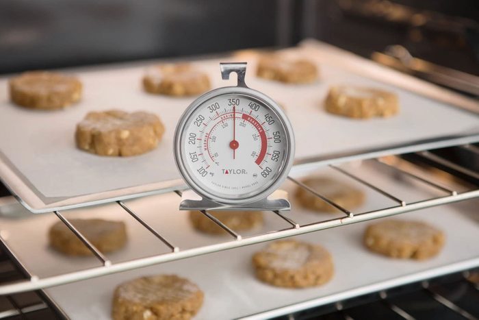 Thermometer in oven with cookies