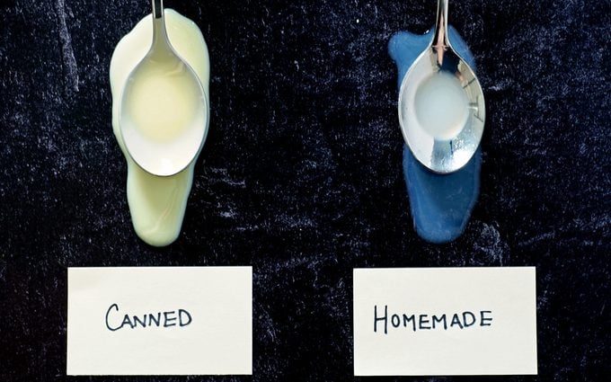 comparison photo of homemade and canned condensed milk on spoons