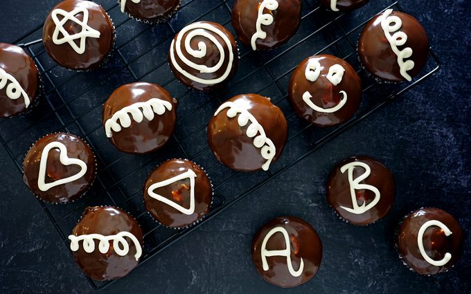 Decorating homemade hostess cupcakes with kids
