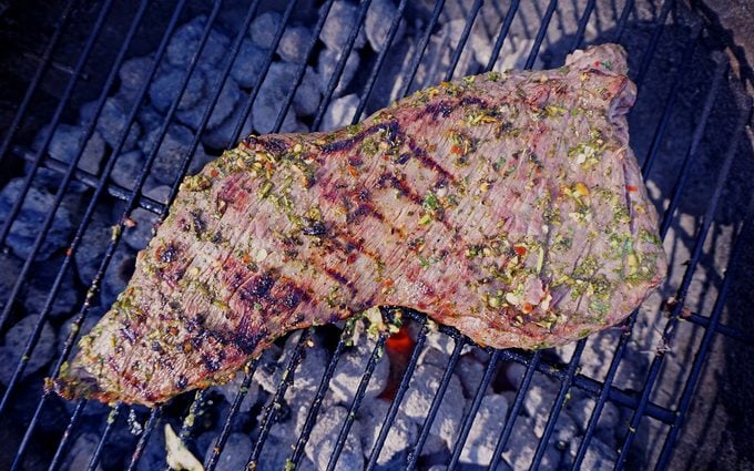 marinated tri-tip steak on the grill