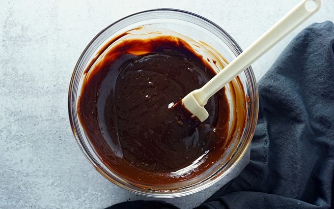 mixing ganache until smooth with vanilla and corn syrup