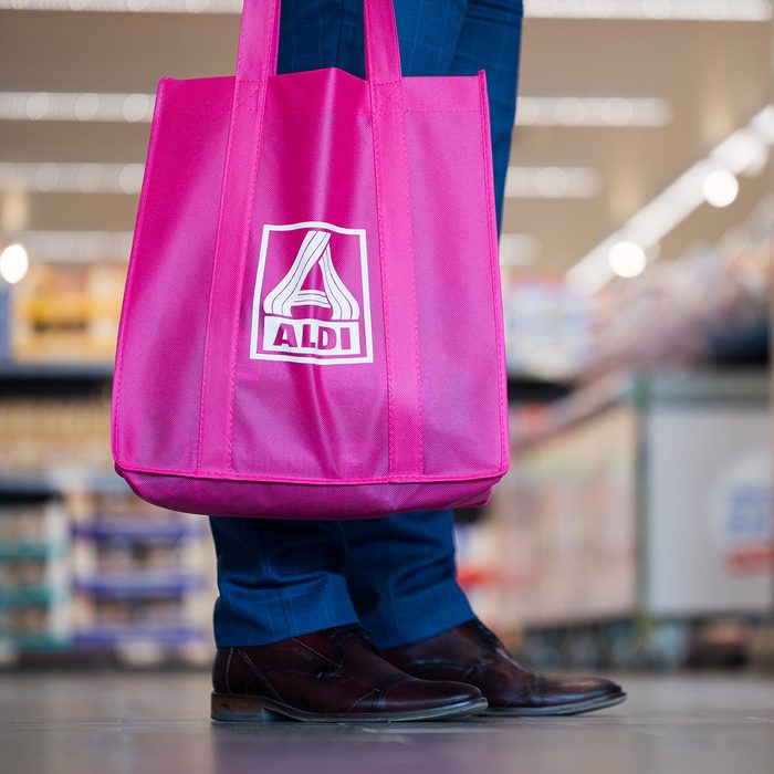 A man seen holding an ALDI North shopping bag with the logo in Herten, Germany, 04 April 2017. ALDI North has introduced a new branch conept. Photo: Rolf Vennenbernd/dpa | usage worldwide (Photo by Rolf Vennenbernd/picture alliance via Getty Images)