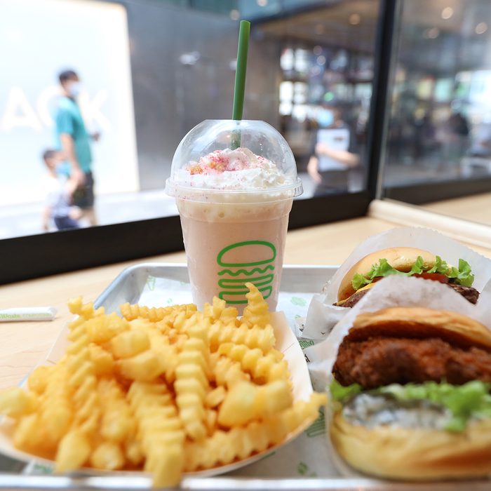 BEIJING, CHINA - AUGUST 13: An order of fast food meal (hamburger, chips and soft drink) at a Shake Shack restaurant at Sanitun on August 13, 2020 in Beijing, China. Shake Shack opened its first restaurant in Beijing on Wednesday. (Photo by VCG/VCG via Getty Images)