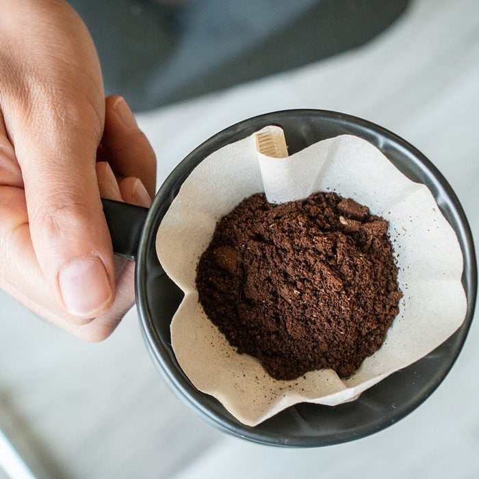 Conceptual of how to making drip coffee by herself.