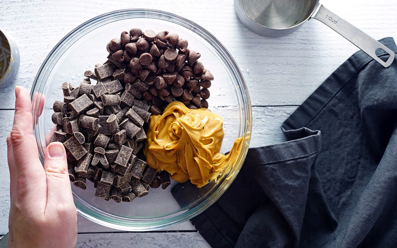 peanut butter cup chocolate layer ingredients in a bowl