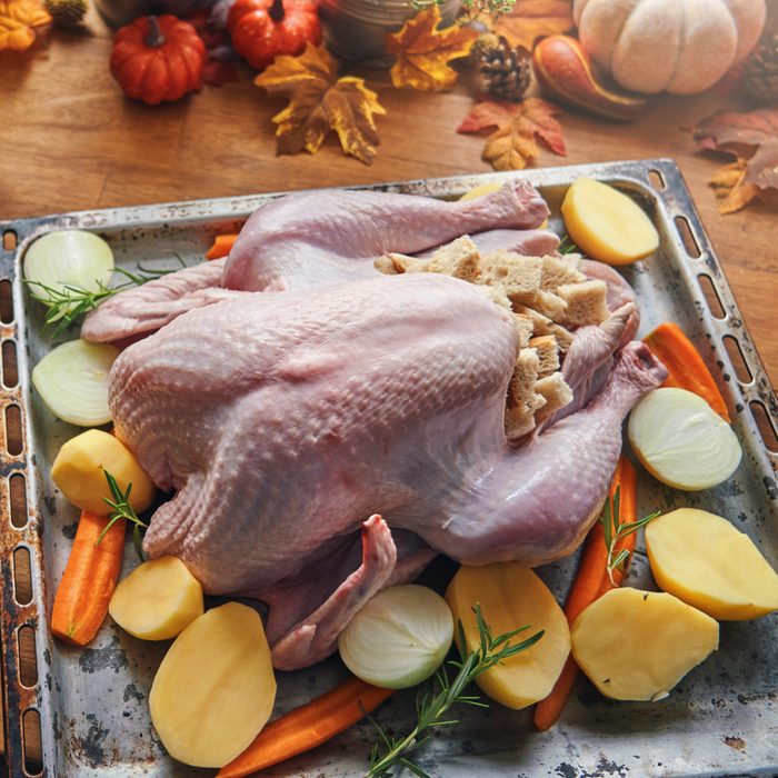 Preparing Stuffed Turkey with Vegetables and Other Ingredients for Holidays